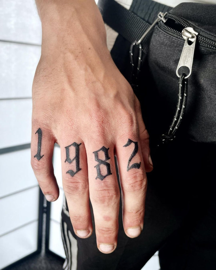 Finger tattoo ideas for men that transform your style and personality