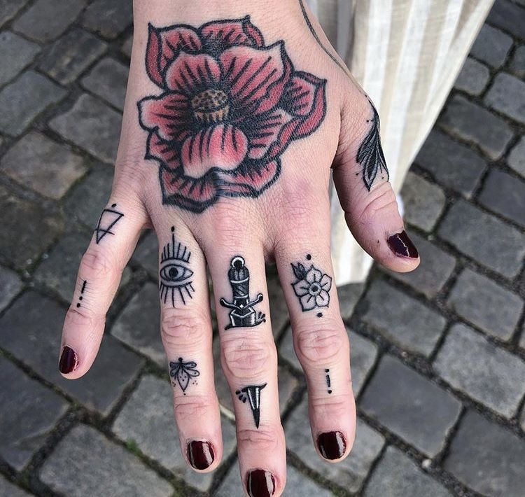 Small hand tattoo designs carved with beauty and personal meaning