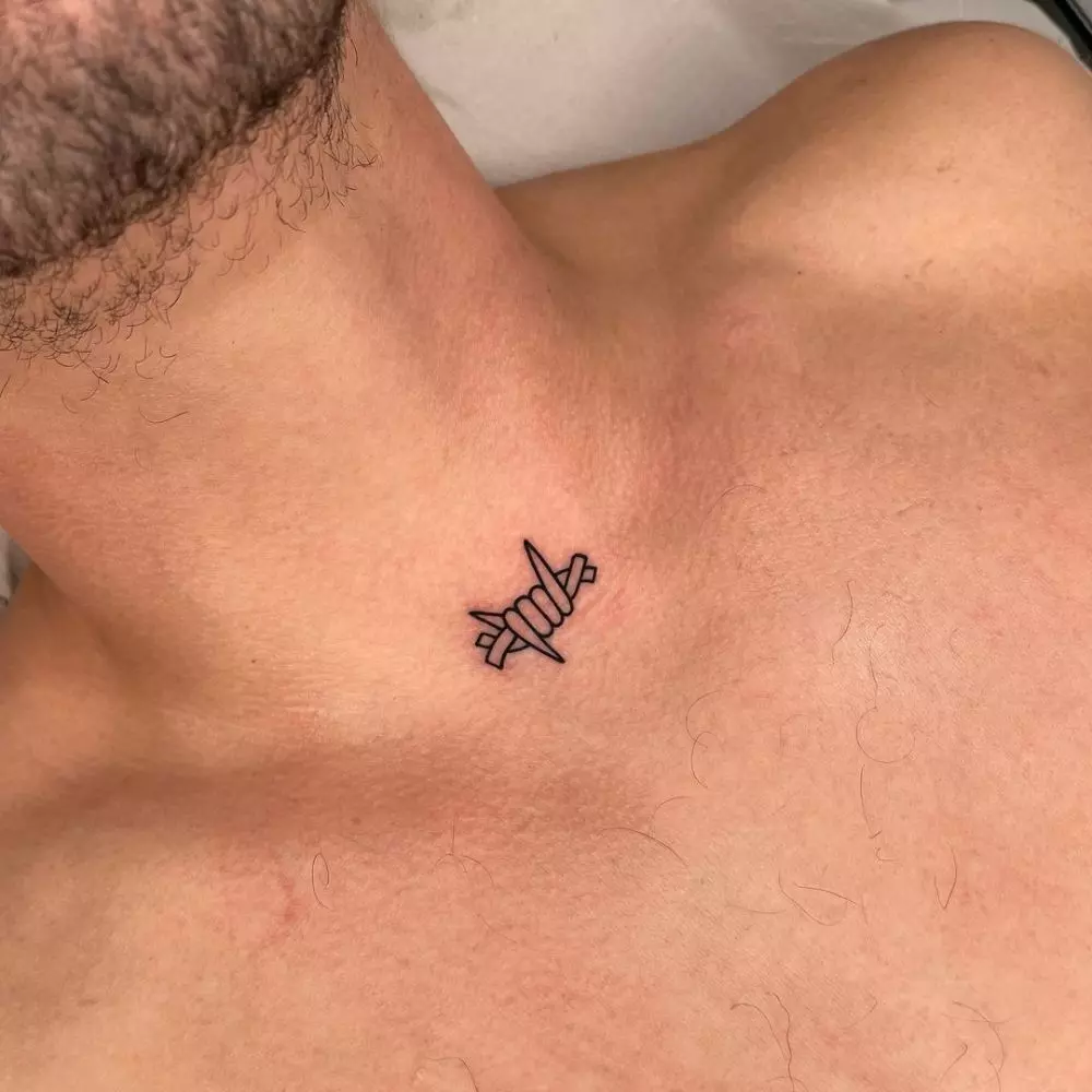 Small neck tattoo carved into your skin for a timeless statement