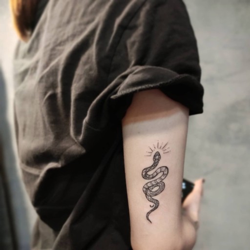 Explore stunning small stitch tattoo designs for meaningful expression